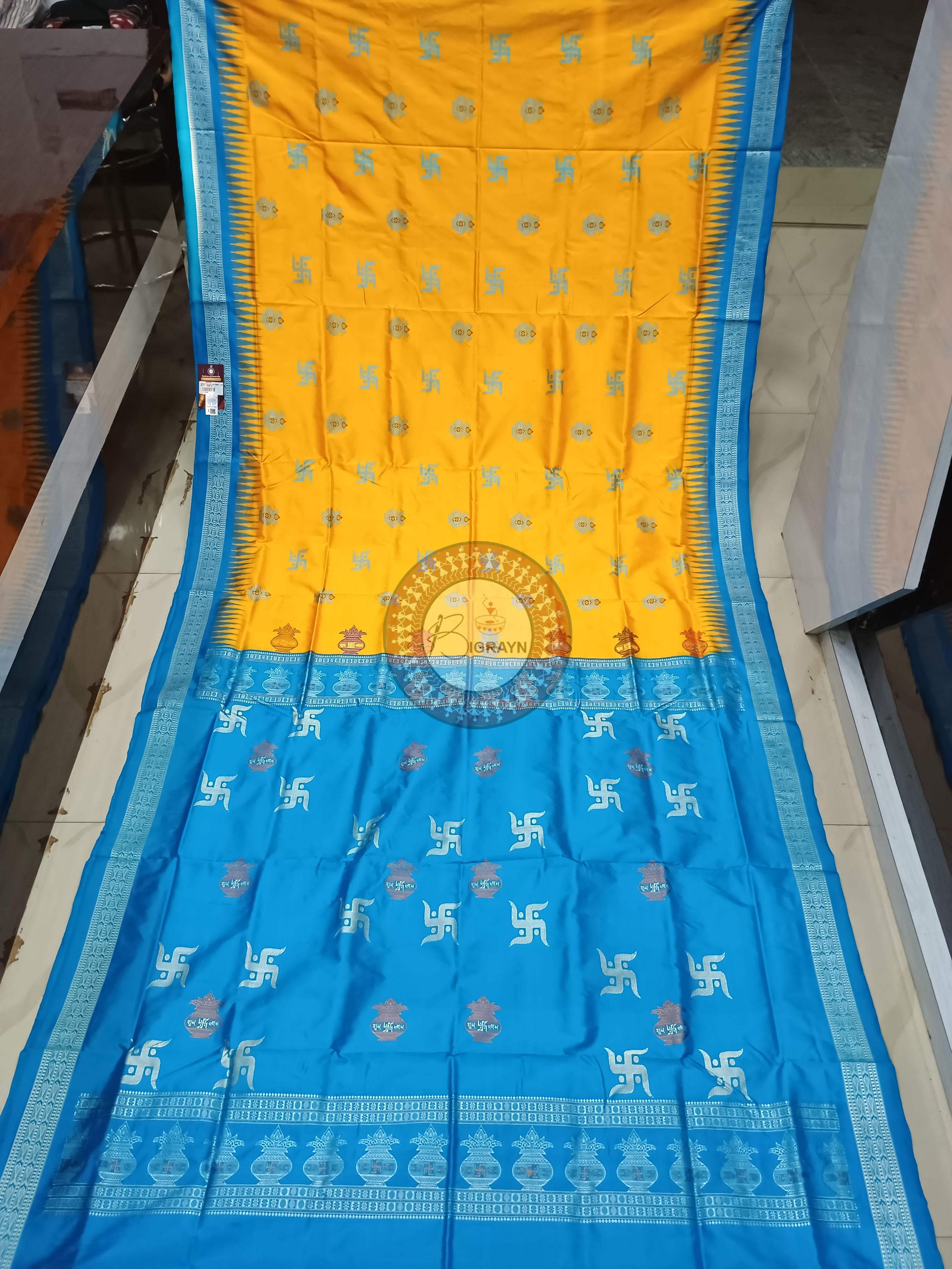 Yellow Copper Sulphate Swastik Kalash Silk Saree