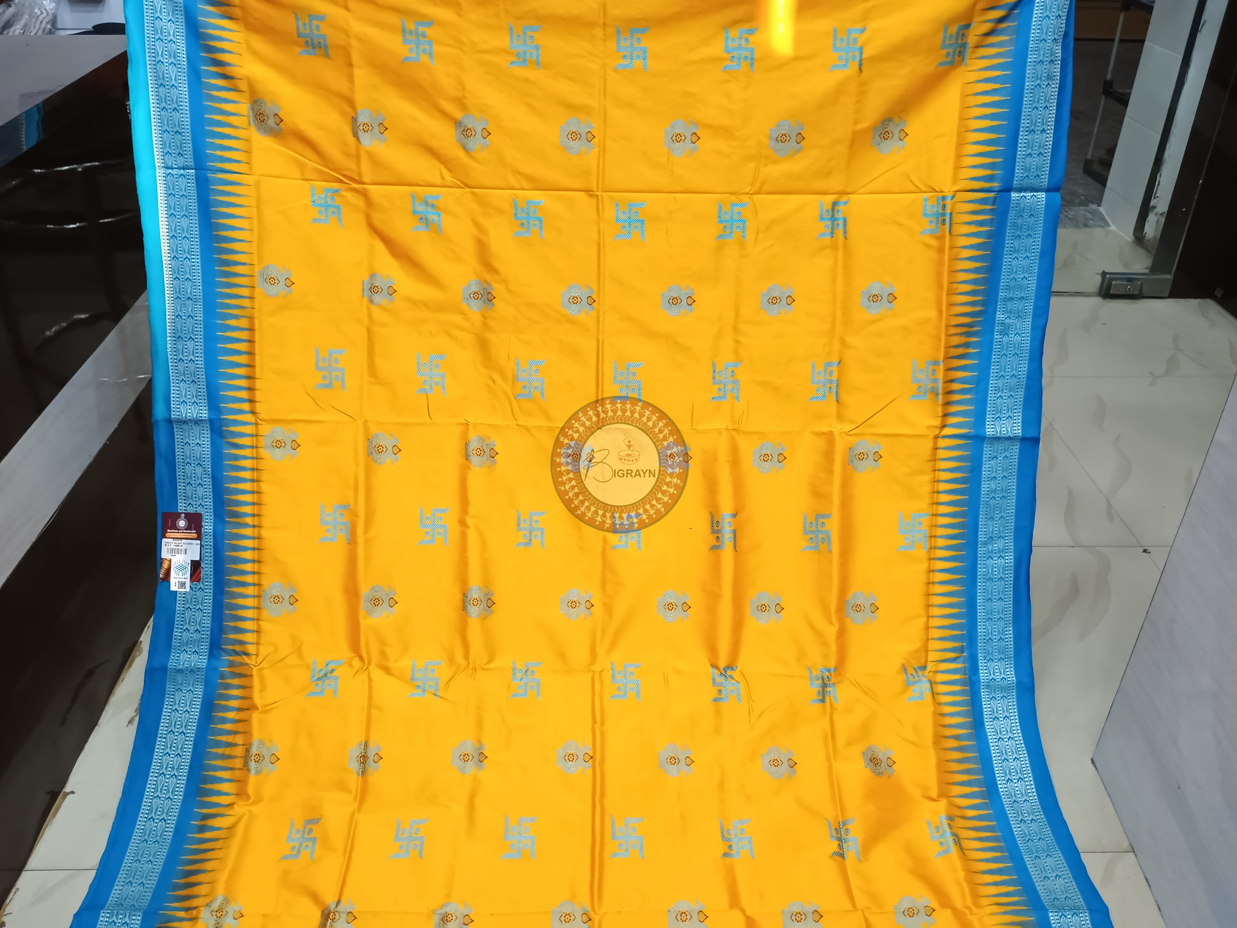 Yellow Copper Sulphate Swastik Kalash Silk Saree