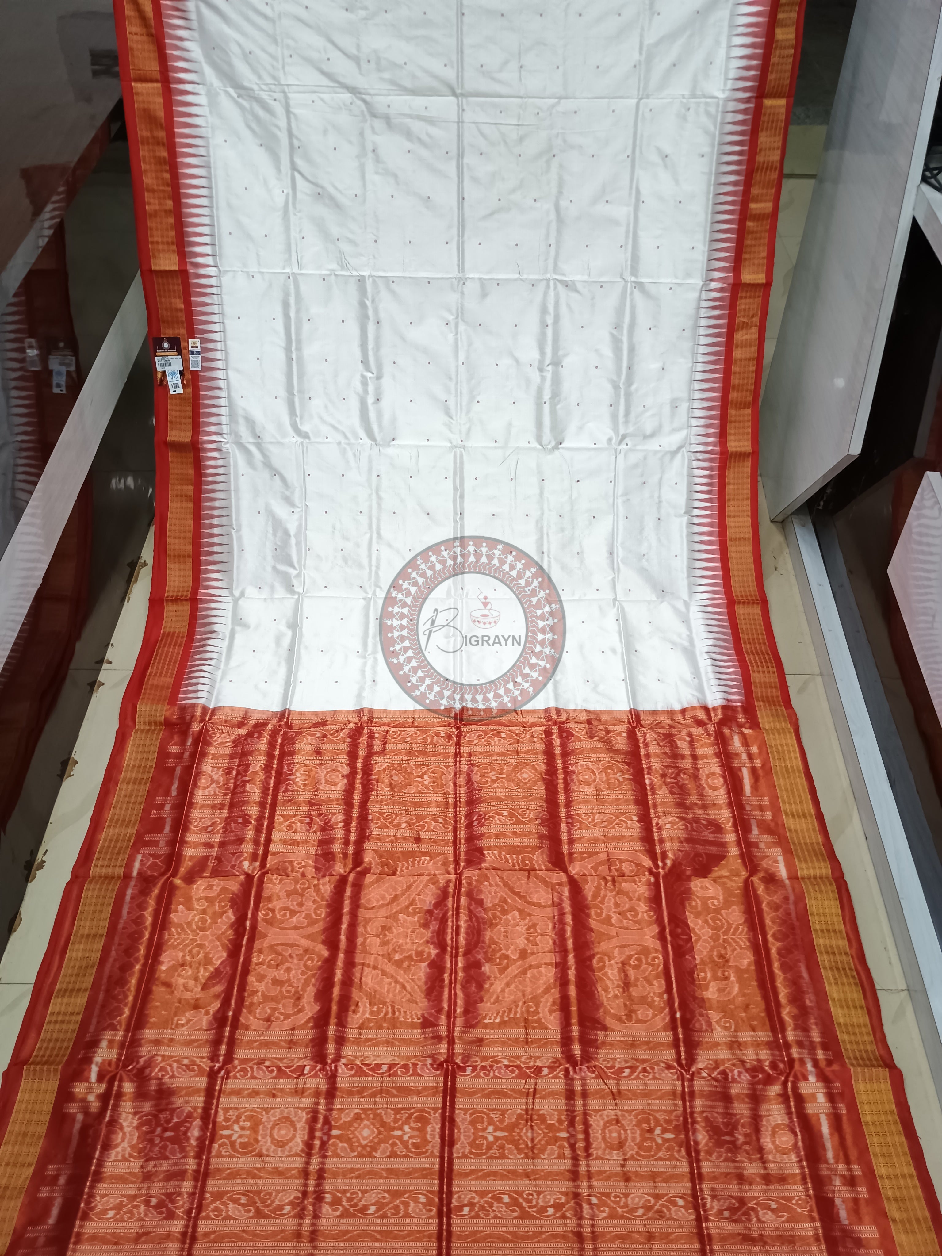 "Odisha Handloom Tissue Silk Saree with shimmering texture, elegant zari border, and lightweight drape, handcrafted by artisans"