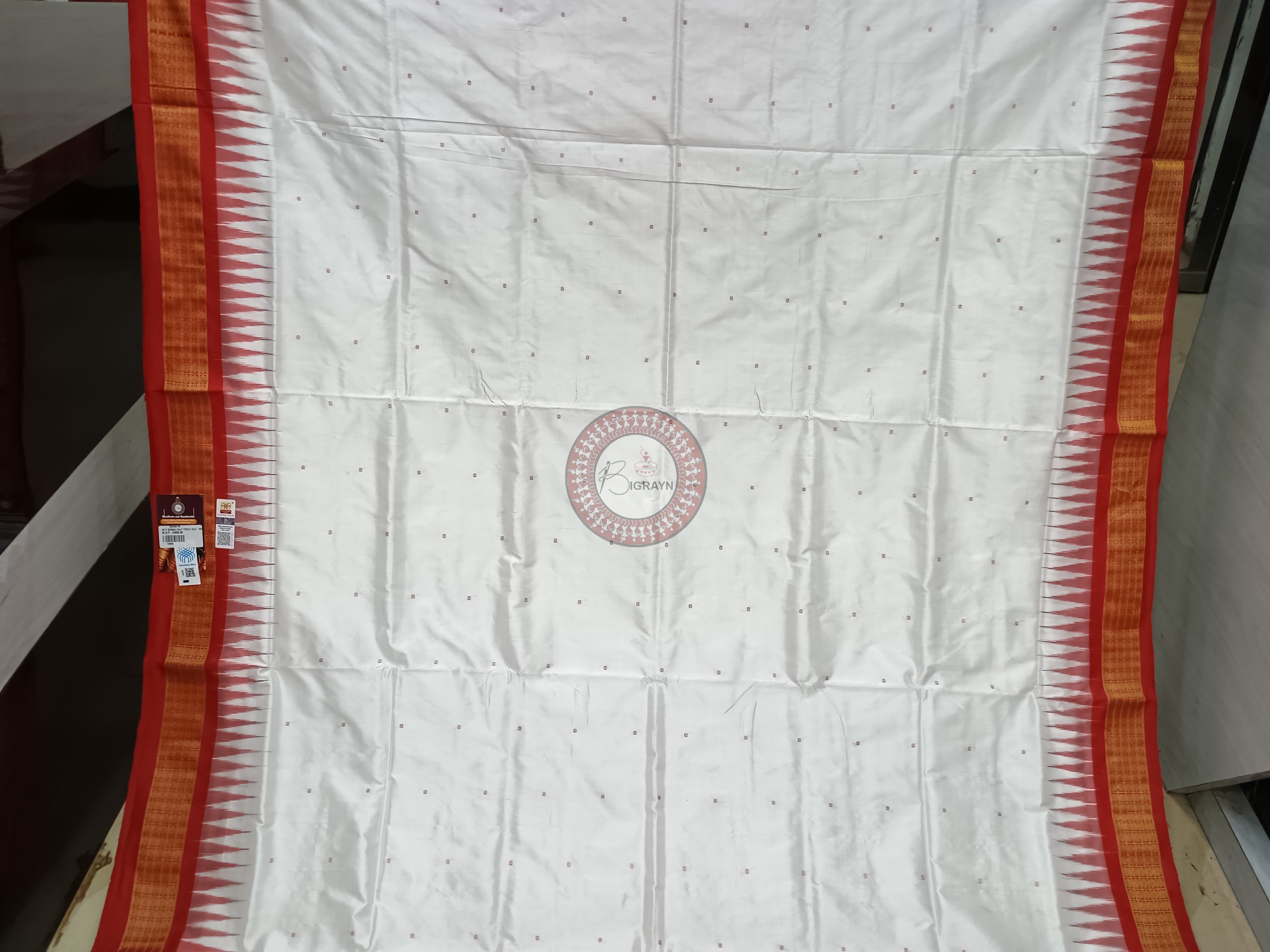 "Odisha Handloom Tissue Silk Saree with shimmering texture, elegant zari border, and lightweight drape, handcrafted by artisans"
