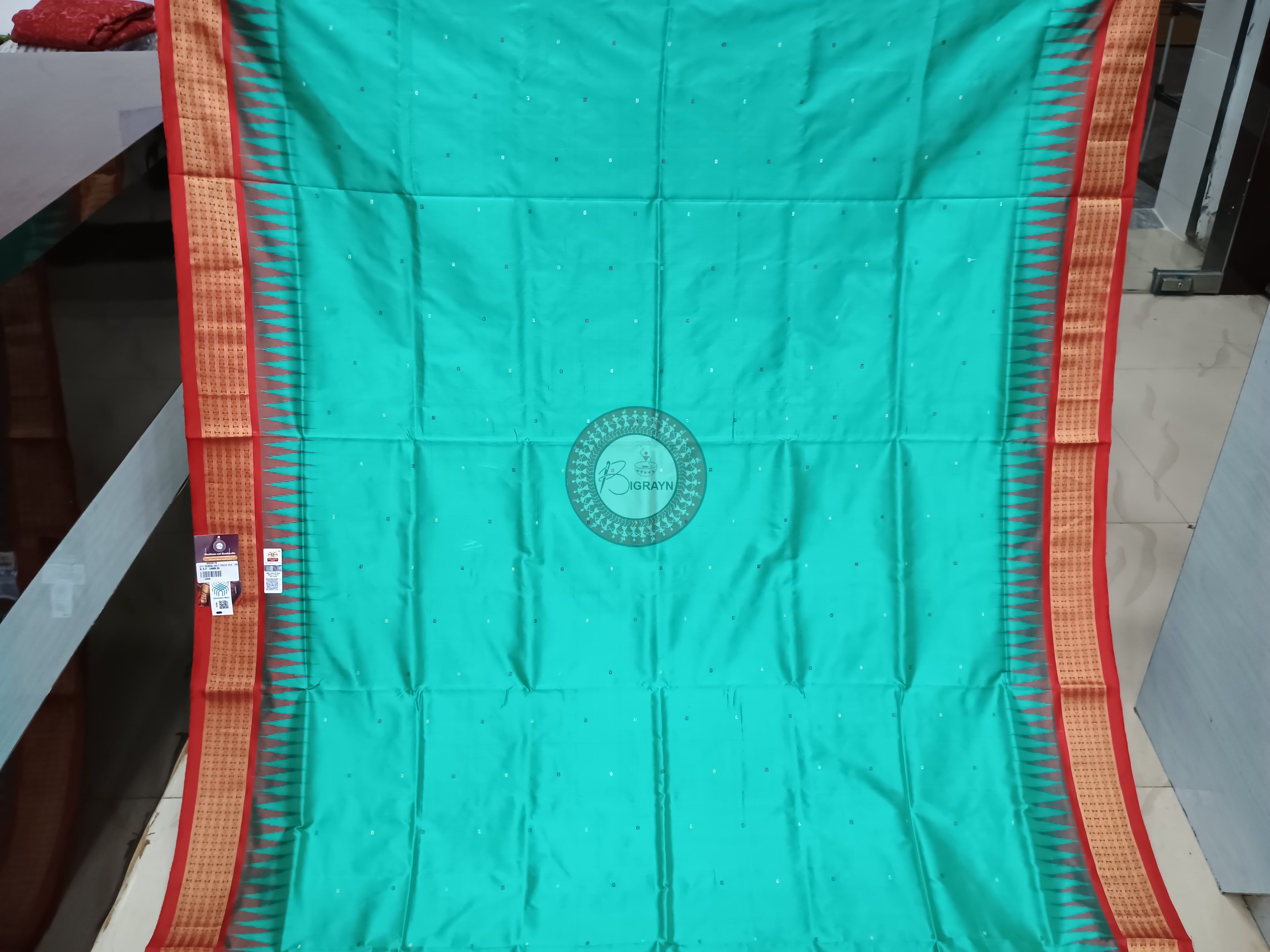 "Odisha Handloom Tissue Silk Saree with shimmering texture, elegant zari border, and lightweight drape, handcrafted by artisans"
