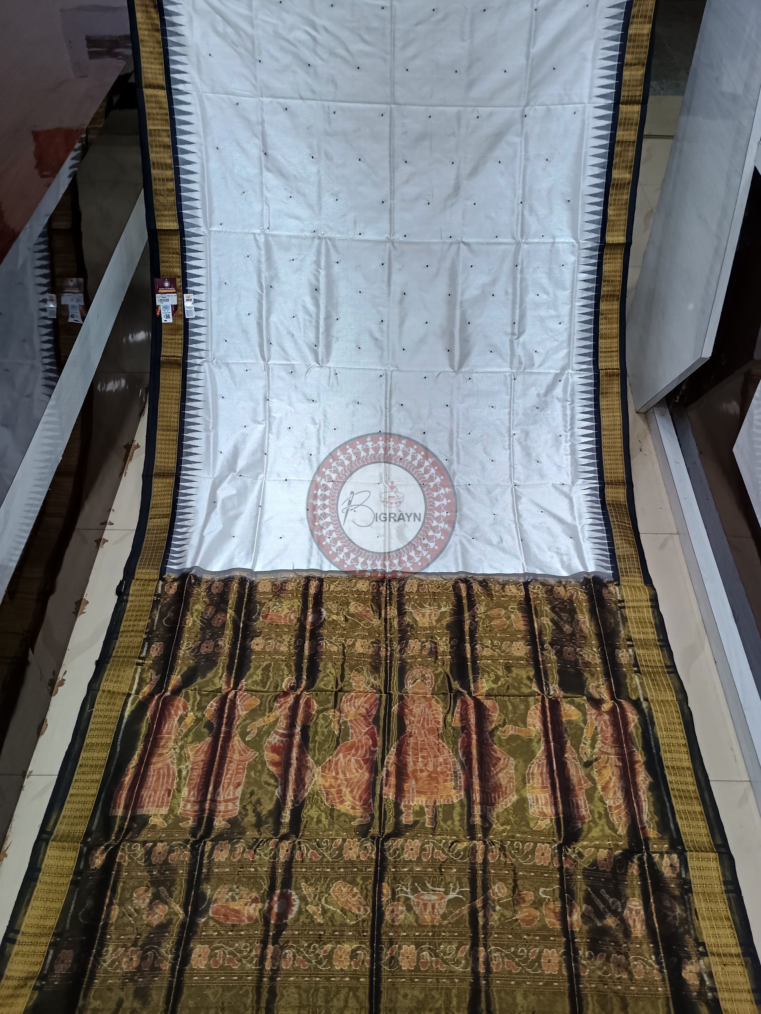 "Odisha Handloom Tissue Silk Saree with shimmering texture, elegant zari border, and lightweight drape, handcrafted by artisans"