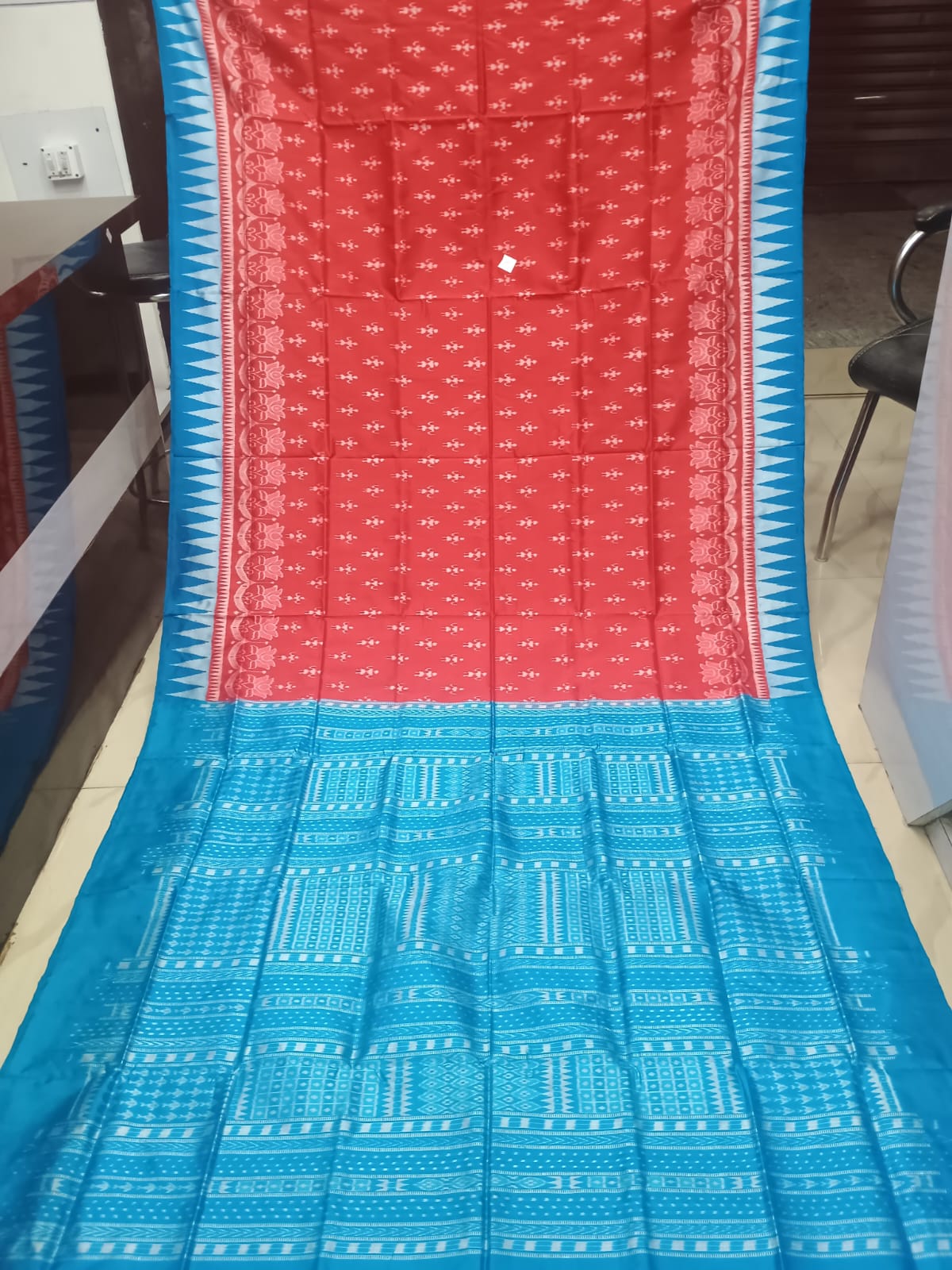 Crimson Red & Turquoise Blue Handwoven Sambalpuri Silk Saree with Tribal Elements and Kalash Motifs