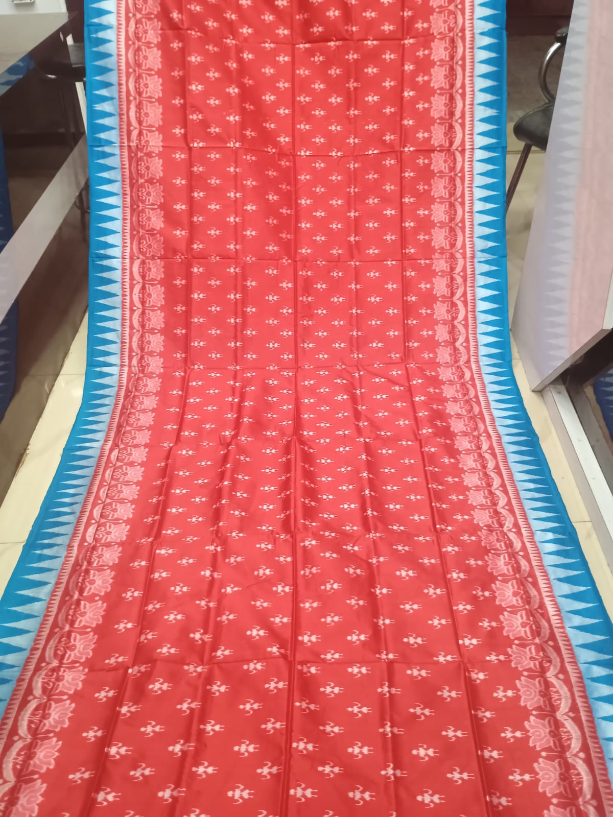 Crimson Red & Turquoise Blue Handwoven Sambalpuri Silk Saree with Tribal Elements and Kalash Motifs