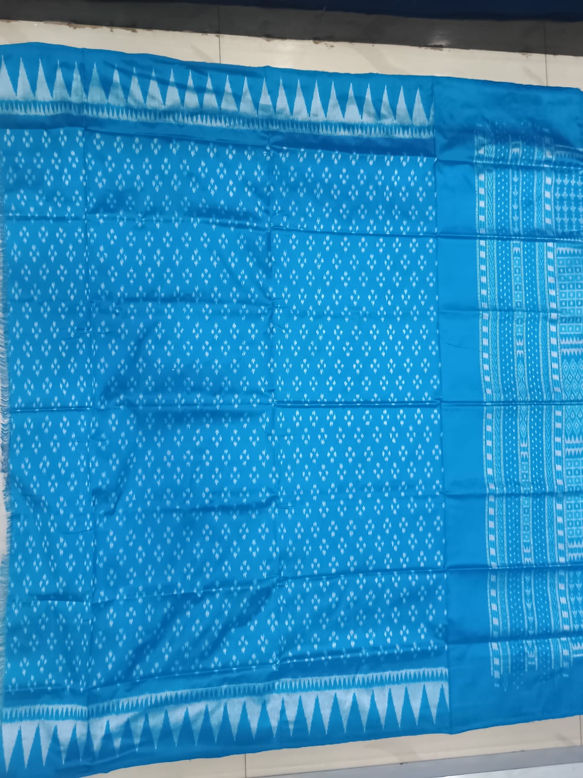 Crimson Red & Turquoise Blue Handwoven Sambalpuri Silk Saree with Tribal Elements and Kalash Motifs