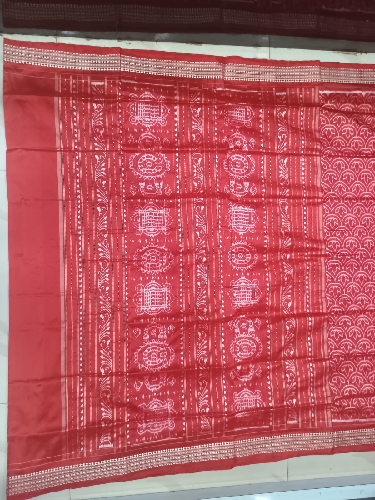 Vermilion Red & Ivory Handwoven Sambalpuri Silk Saree with All-Over Conch Shell Patterns and Jhoti Pallu