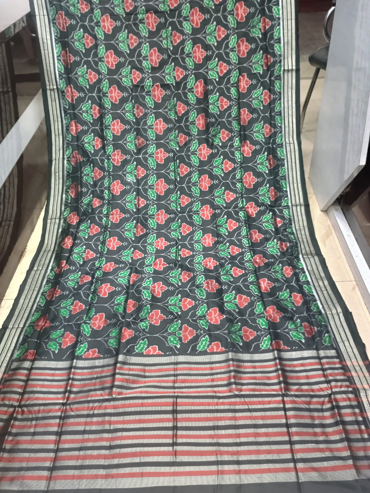 Midnight Black Handwoven Sambalpuri Silk Saree with Vibrant Red and Green Floral Vani Motifs