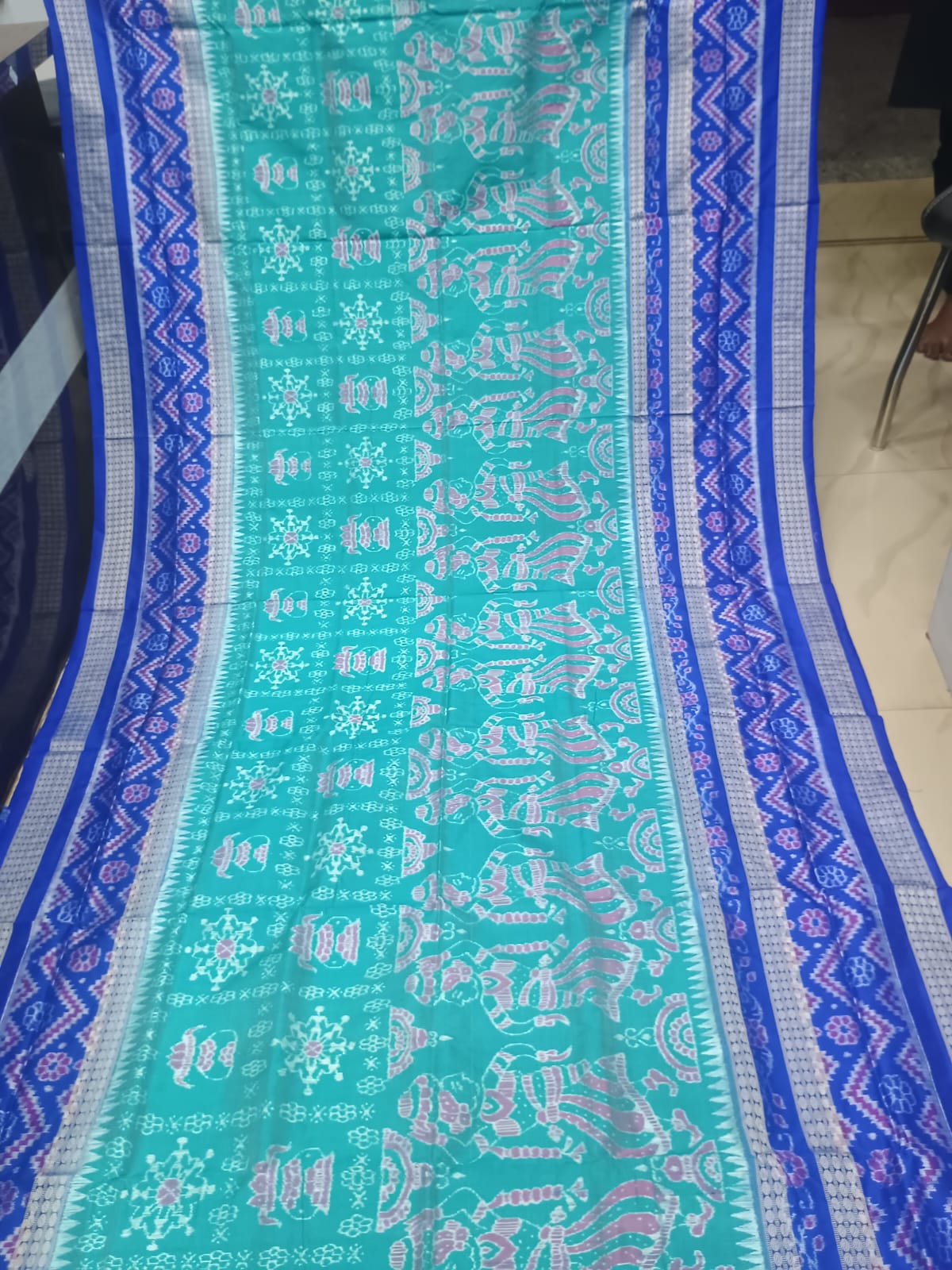 Sea Green & Royal Blue Handwoven Sambalpuri Silk Saree with Tribal Dancing Figures and Mandala Pallu