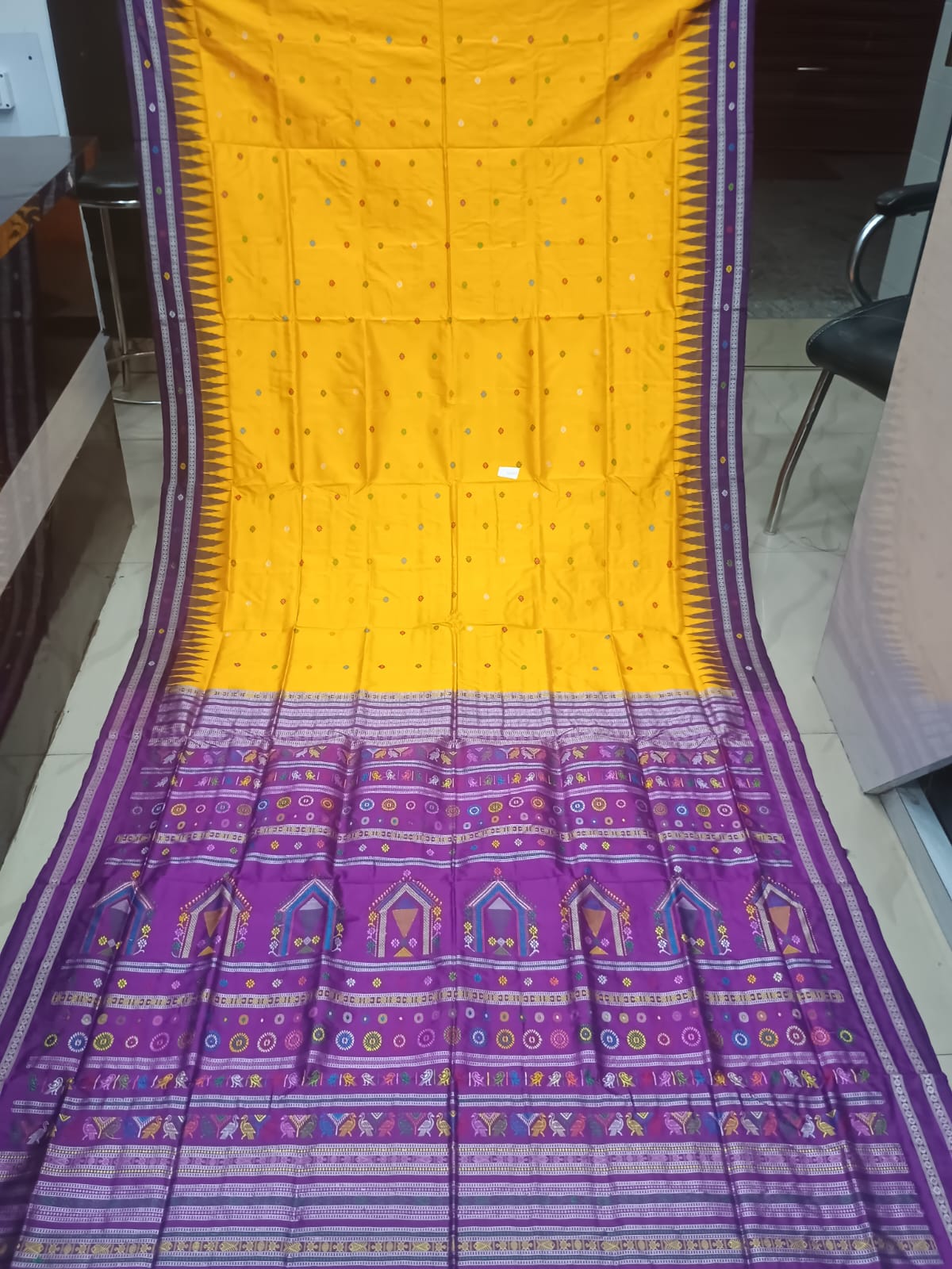 Mustard Yellow & Purple Handwoven Sambalpuri Silk Saree with Traditional Hut and Bird Motifs