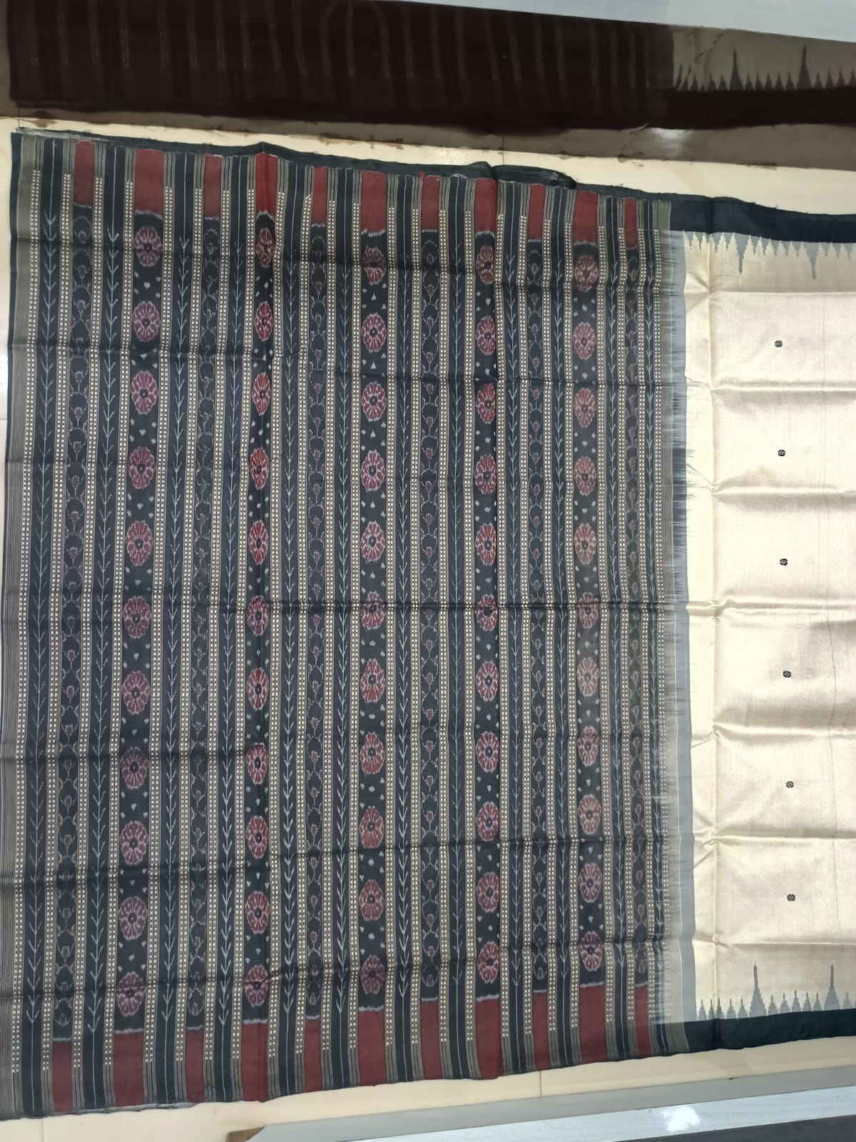 Off-White and Jet Black Sambalpuri Handloom Saree with Ikat Pallu