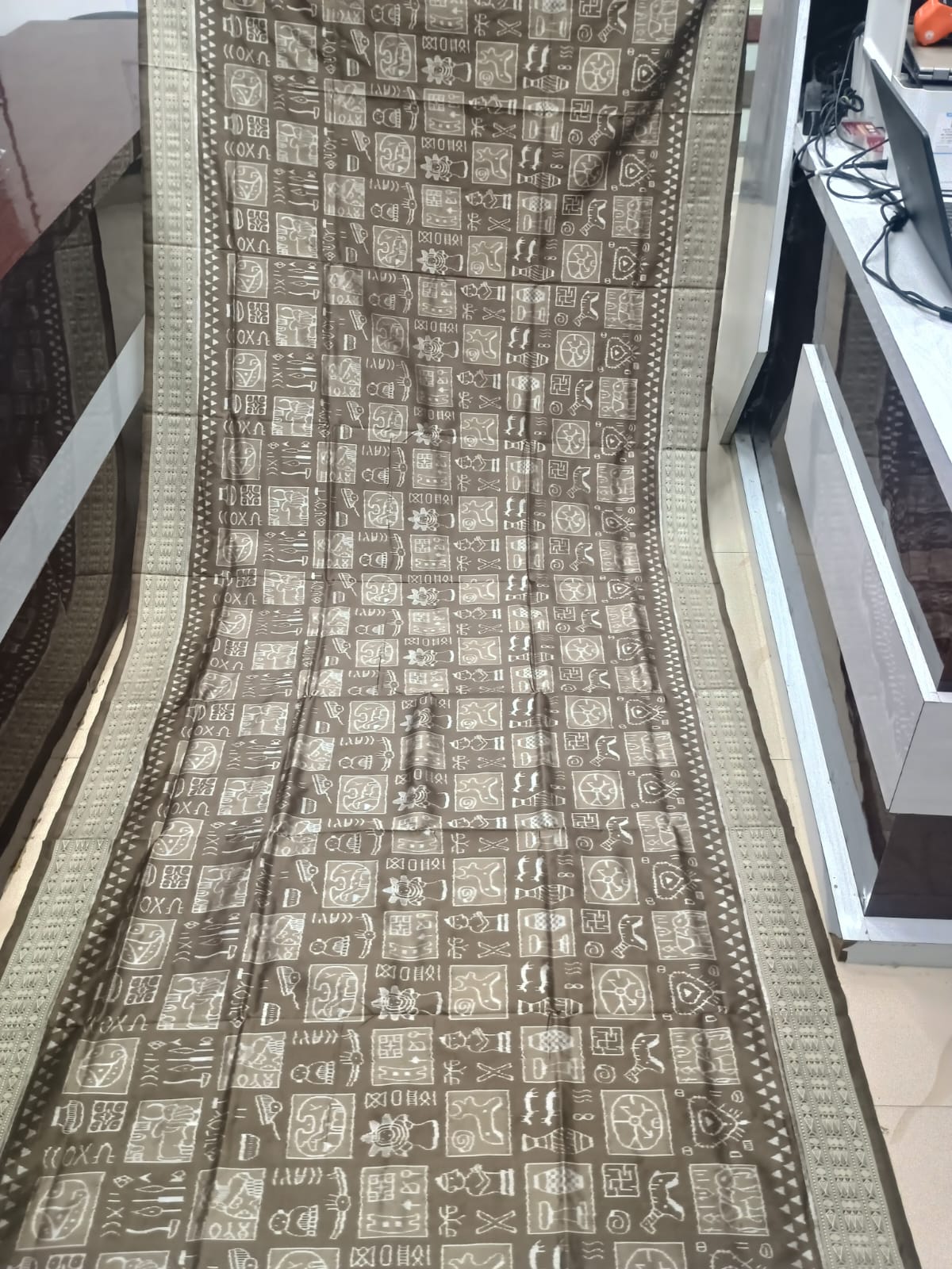 Tussar Brown and Cream Handwoven Harappan Script Sambalpuri Pure Silk Saree