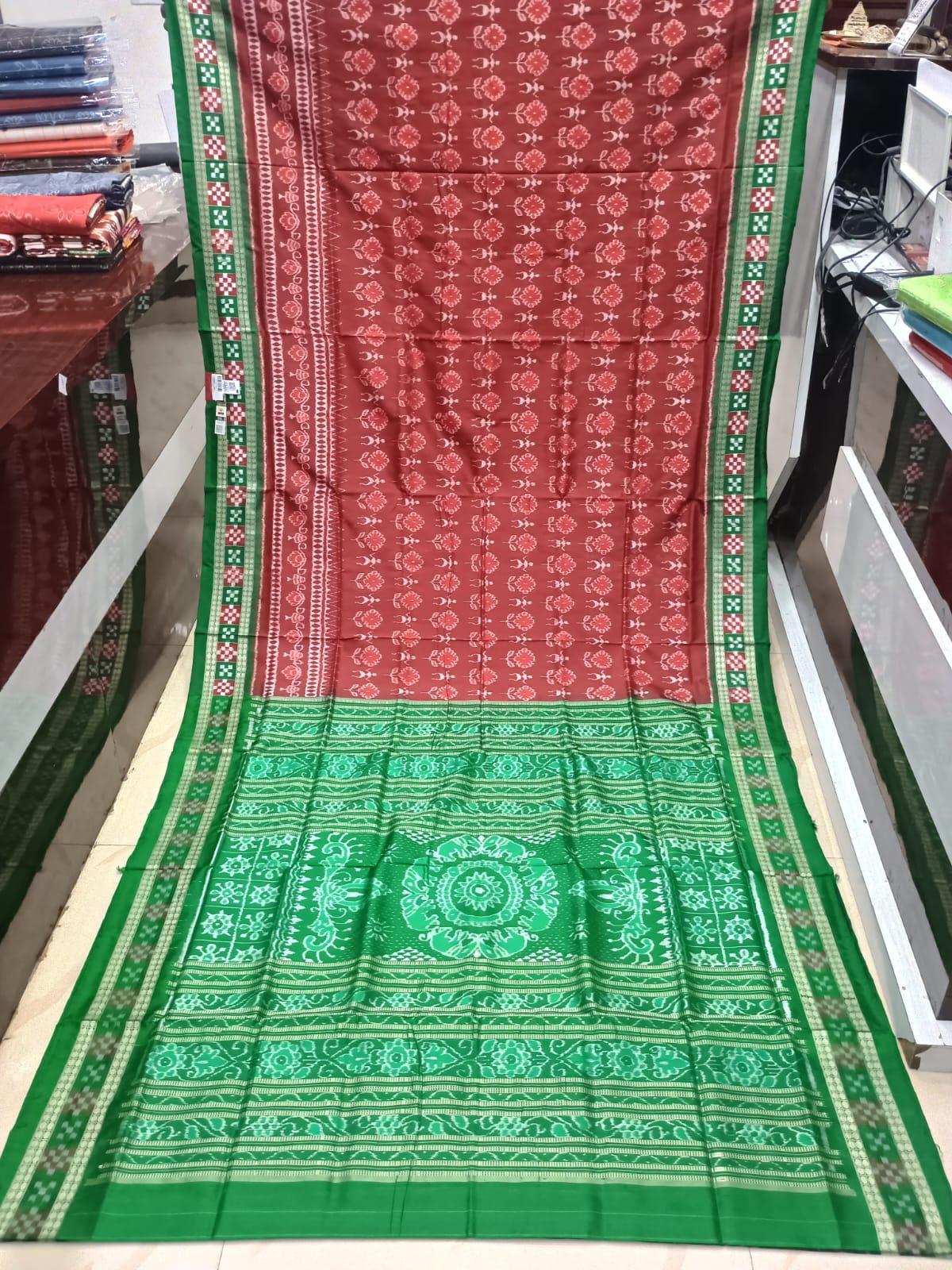 Brick Red and Parrot Green Handwoven Sambalpuri Bomkai Silk Saree with All-Over Floral Buttas