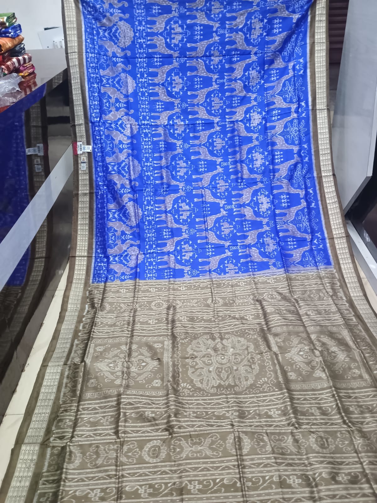 Royal Blue and Antique Bronze Handwoven Sambalpuri Bomkai Silk Saree with Wildlife Motifs