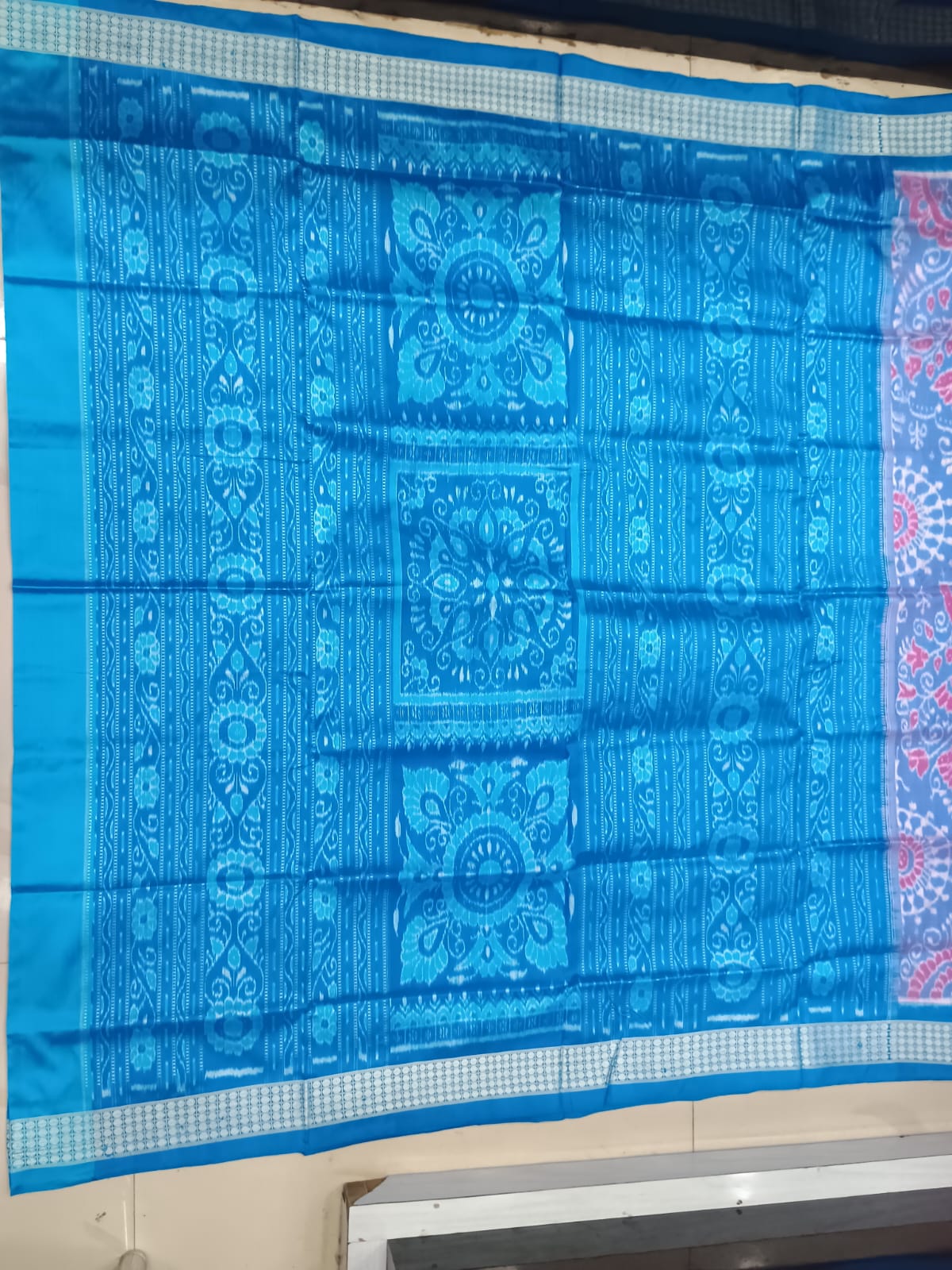Sky Blue and Cyan Blue Handwoven Sambalpuri Bomkai Silk Saree with Rani Pink Accents