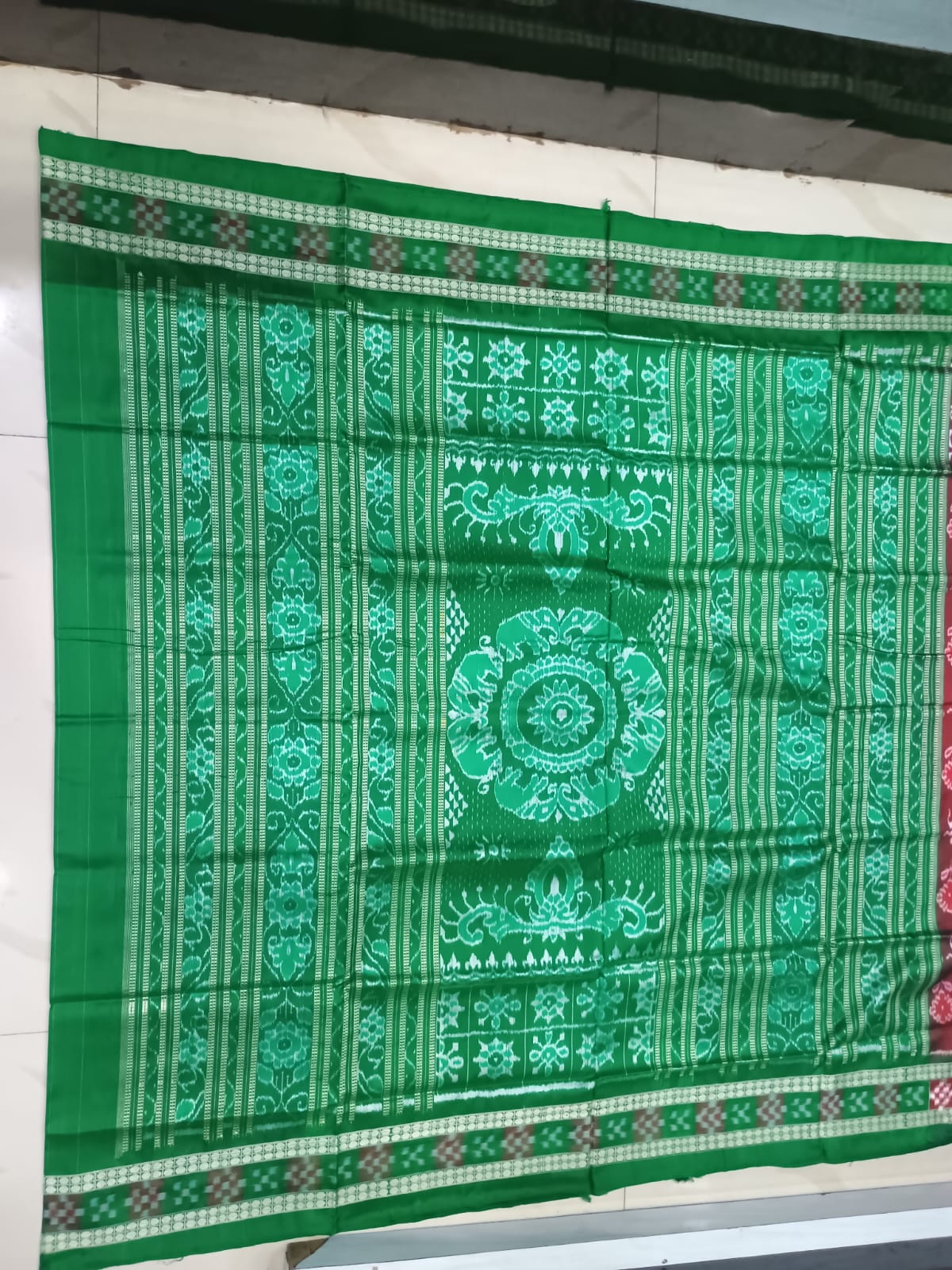 Brick Red and Parrot Green Handwoven Sambalpuri Bomkai Silk Saree with All-Over Floral Buttas
