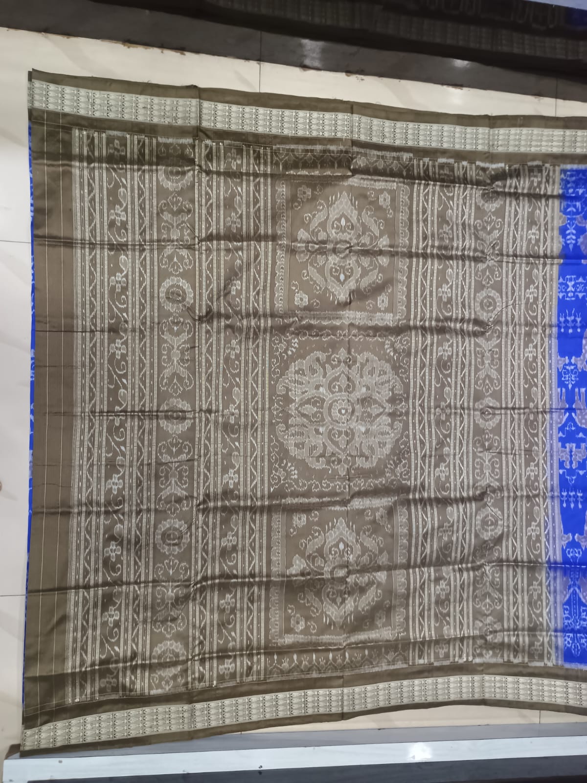 Royal Blue and Antique Bronze Handwoven Sambalpuri Bomkai Silk Saree with Wildlife Motifs