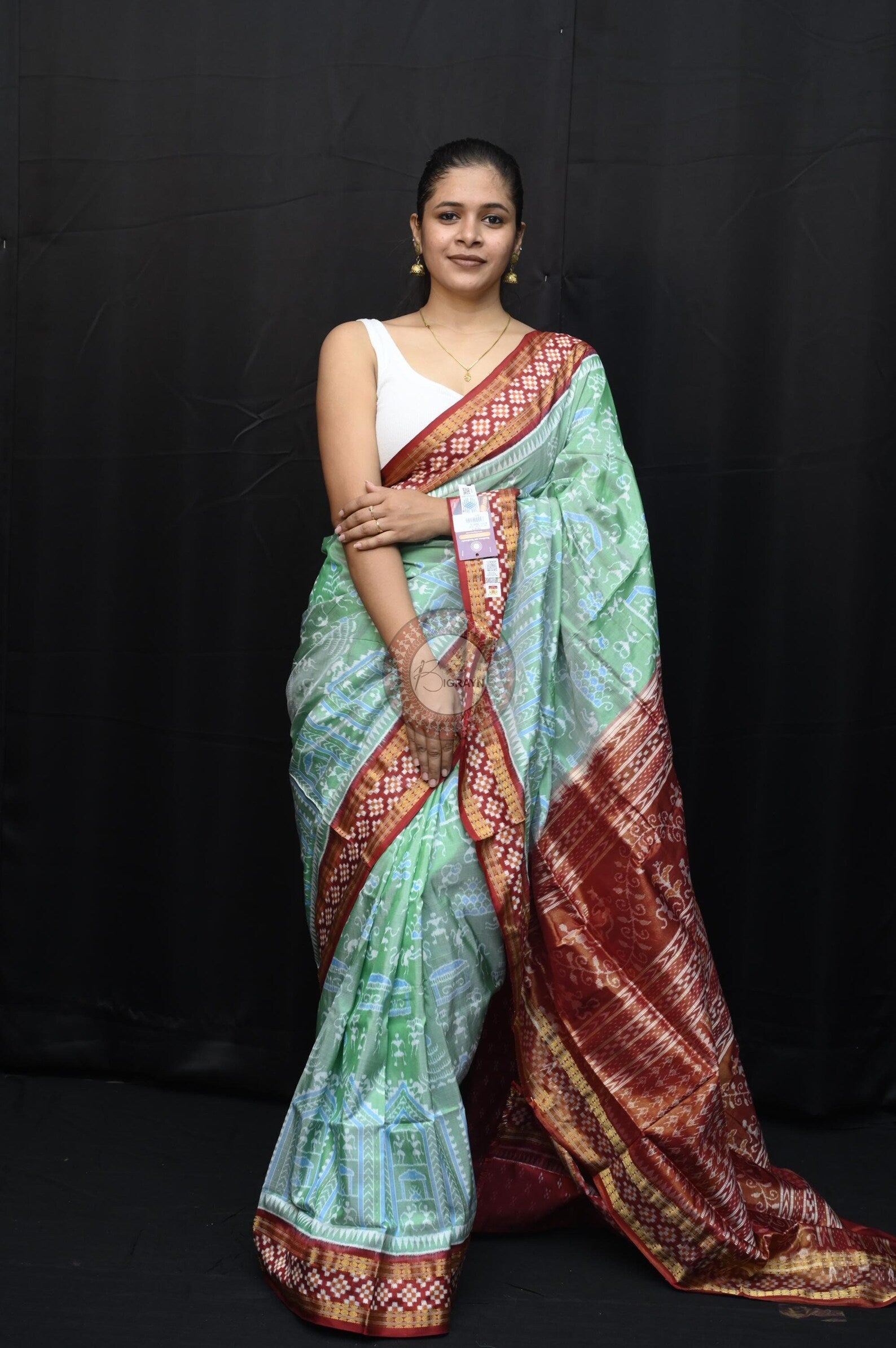 "Odisha Handloom Tissue Silk Saree with shimmering texture, elegant zari border, and lightweight drape, handcrafted by artisans"