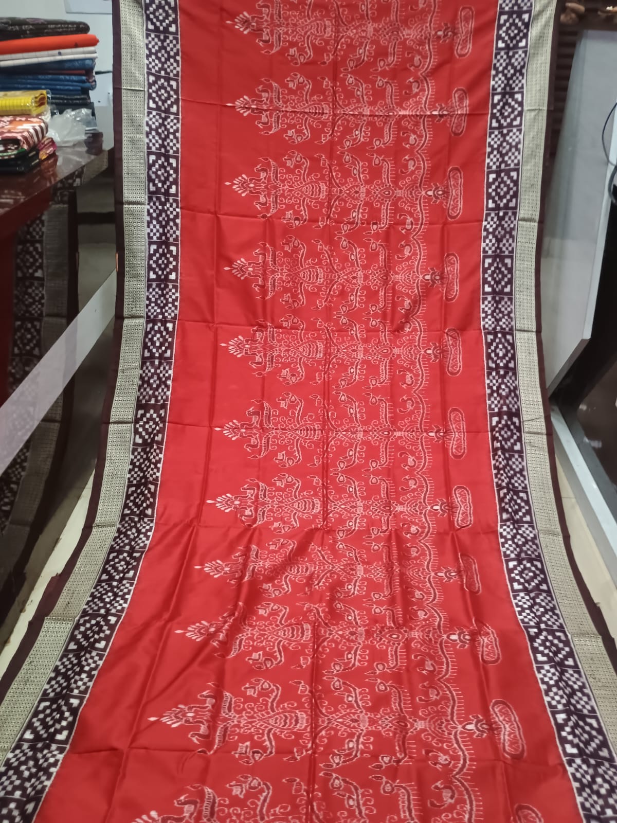 Rust Red and Chocolate Brown Handwoven Sambalpuri Bomkai Silk Saree with Tree of Life & Dance Motifs